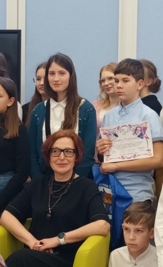 Autorka książek z uczniami